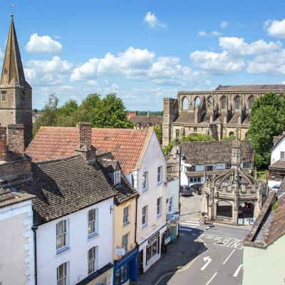 View of Malmesbury Abbey and other listed buildings